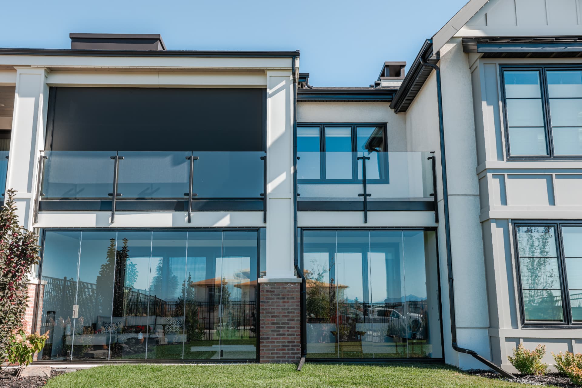 Glass balcony railings and glazing on a modern home