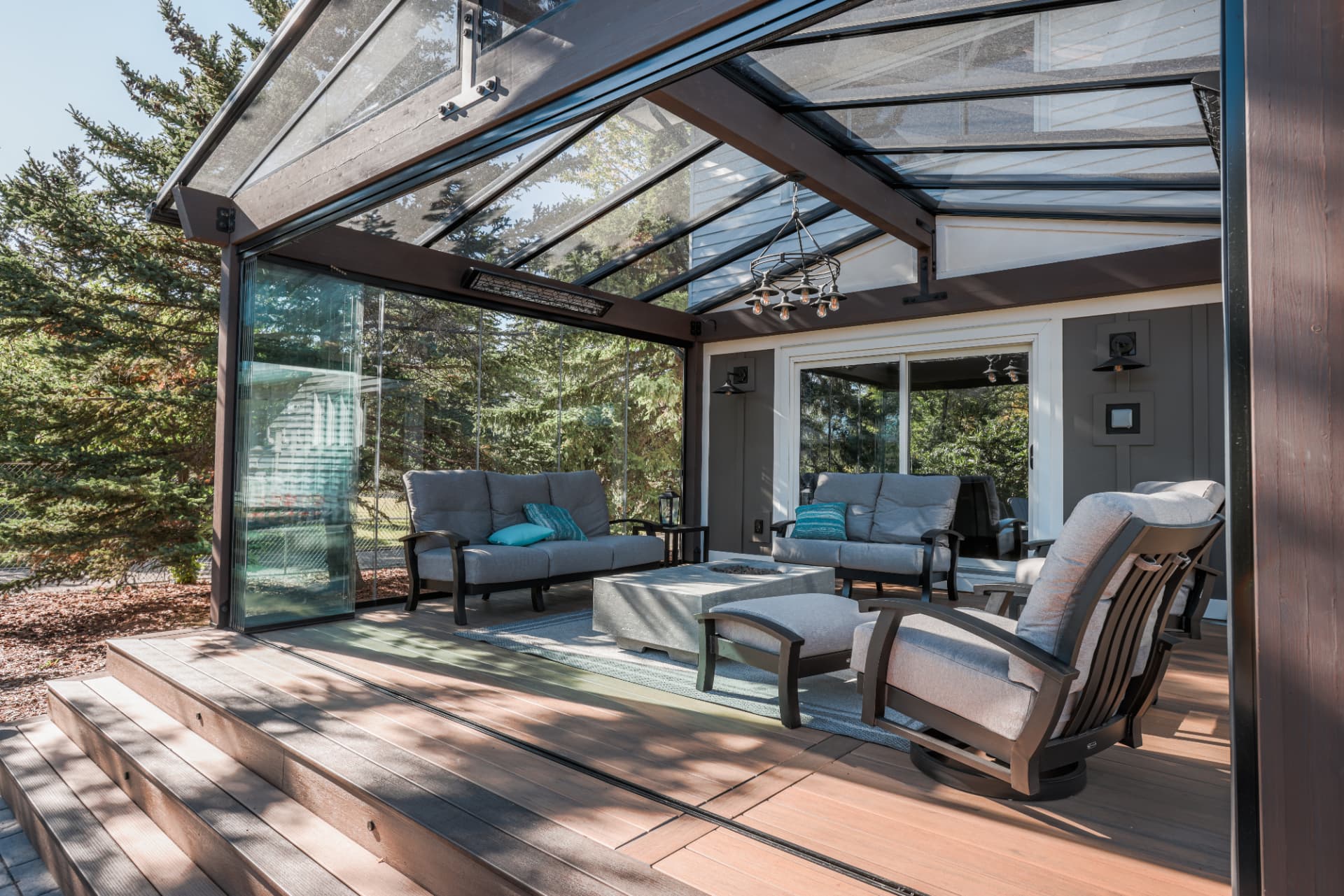 Angled view into the glass room from the composite deck steps